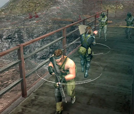 Imagen de Snake junto a un recluta enfrentándose a unos soldados en el juego Metal Gear Peacewalker.